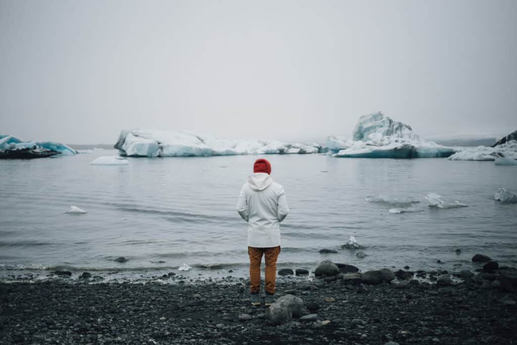 What Are The Benefits of Traveling?Tourist watch glacier in water in iceland